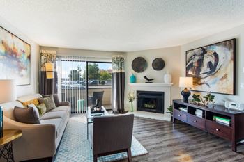 Living Room with Fireplace at Deer Crest Apartments, Broomfield, 80020